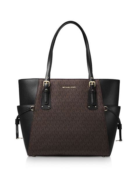 michael kors voyager east west crossgrain leather tote oxblood|Michael Kors voyager signature tote.